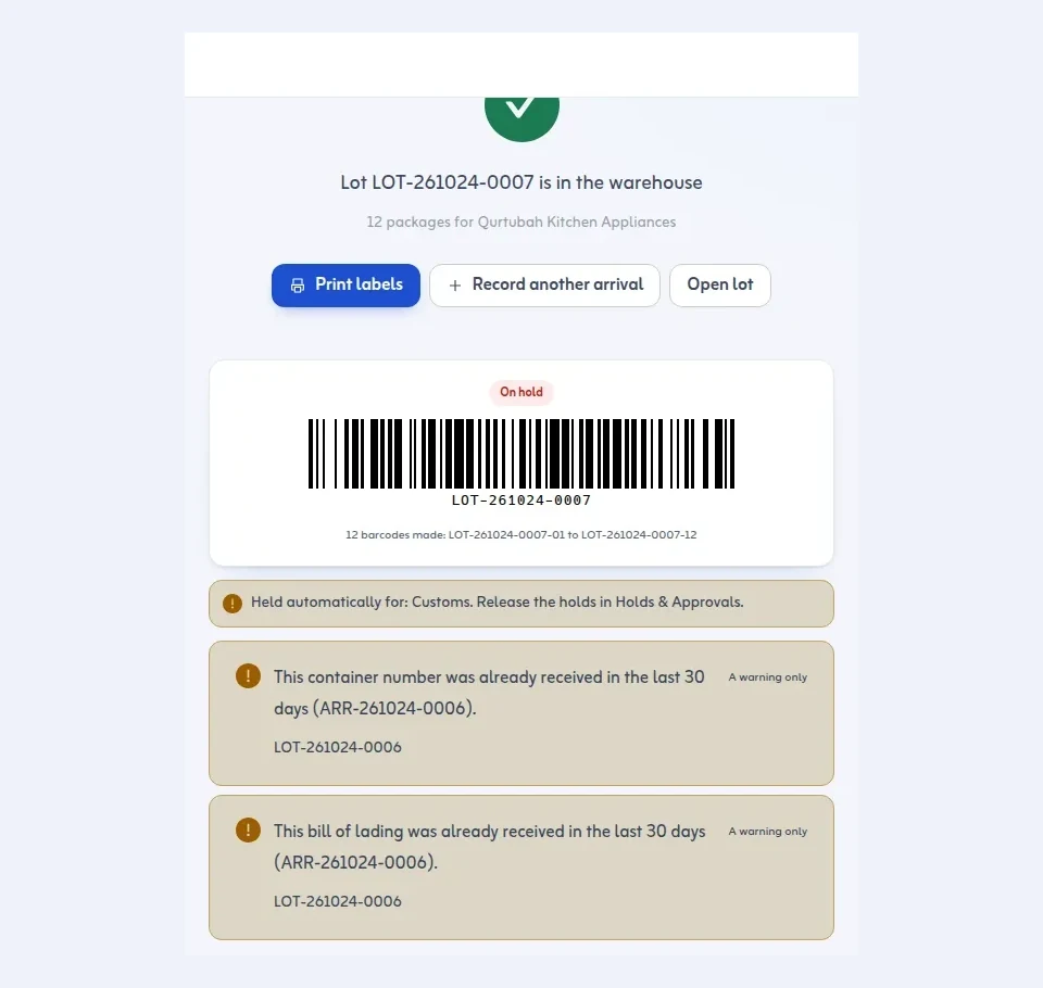 After saving an arrival: the lot number, one barcode per package and the Print labels button